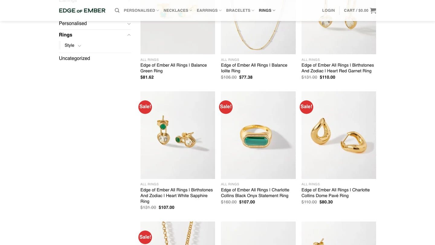 Shop A's rings category under the Edge of Ember logo, showing earrings and a necklace listed as rings